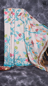 Off-White and Baby Blue Multicolor Bird Pattern Jamdani Tussar Saree